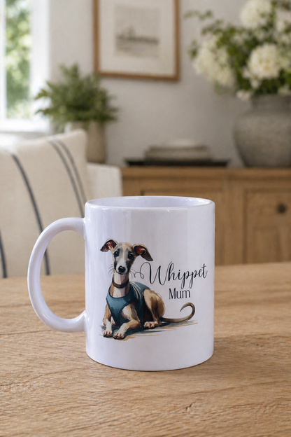 White mug with a dog illustration and 'Whippet Mutt' text on a wooden table.