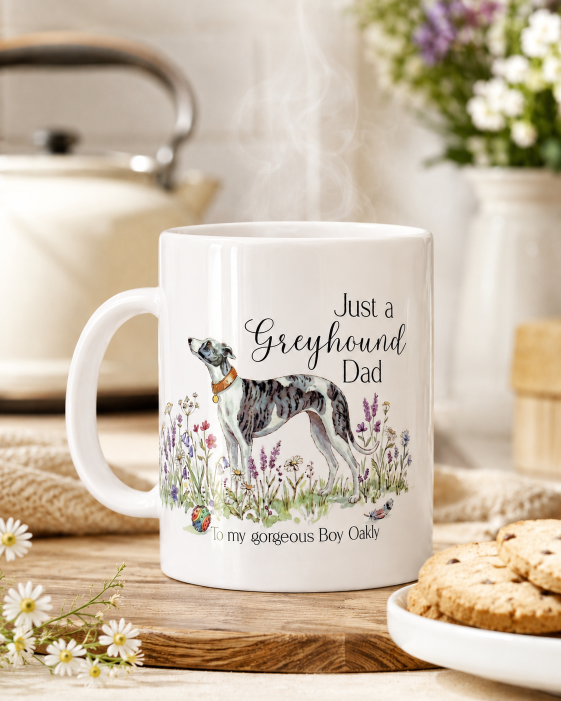 White mug with a dog illustration and text on a wooden table with flowers and cookies.