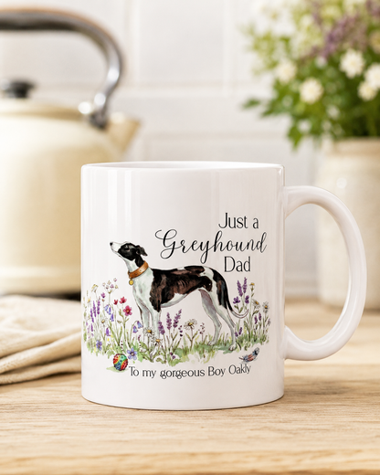 Mug with a greyhound illustration and text on a wooden surface